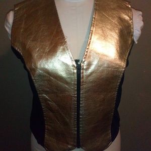 Gold and black shinny vest.